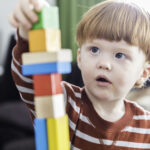 Boy Playing With Blocks